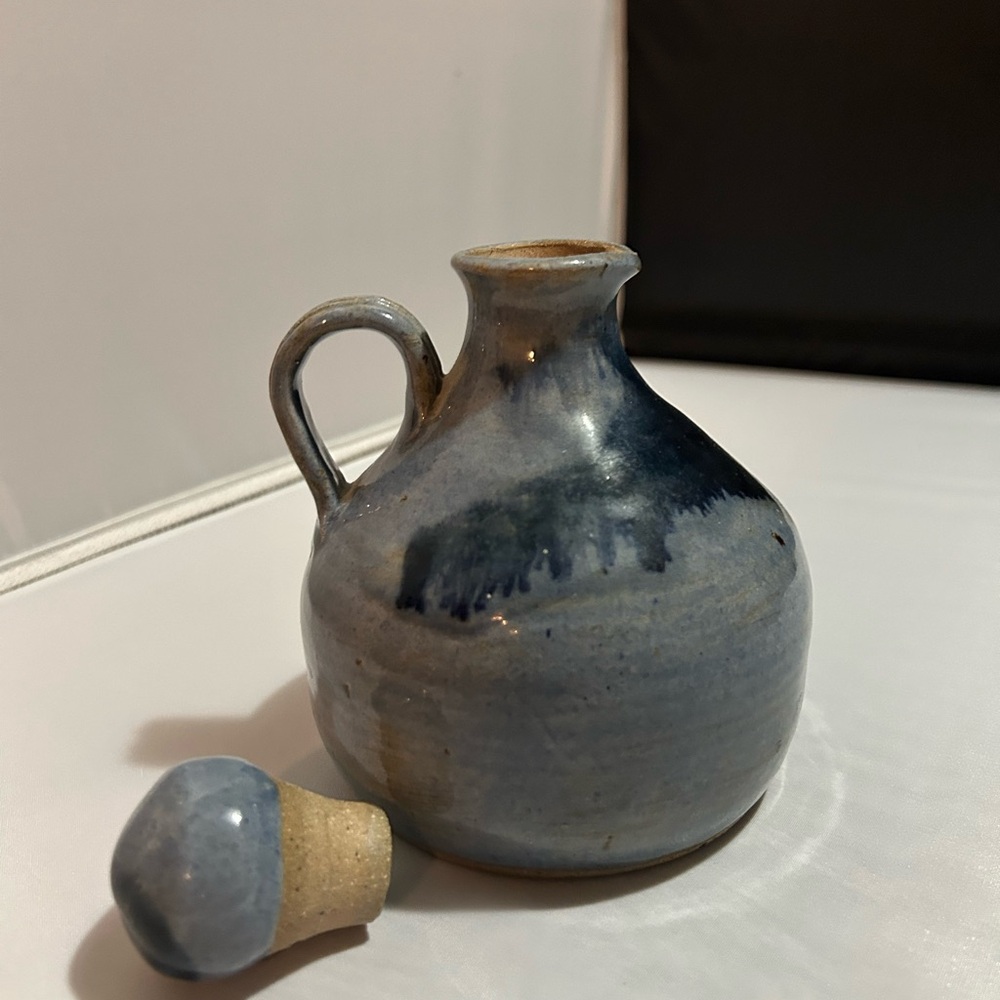 Hand thrown signed pottery jug with stopper
